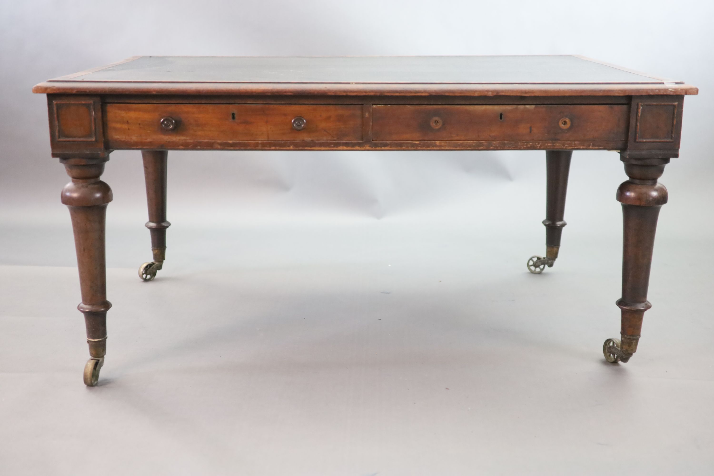 A Victorian mahogany library table, W.152cm D.105cm H.75cm